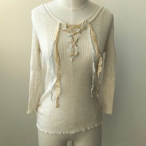 Cute top with ribbon lace-up front.